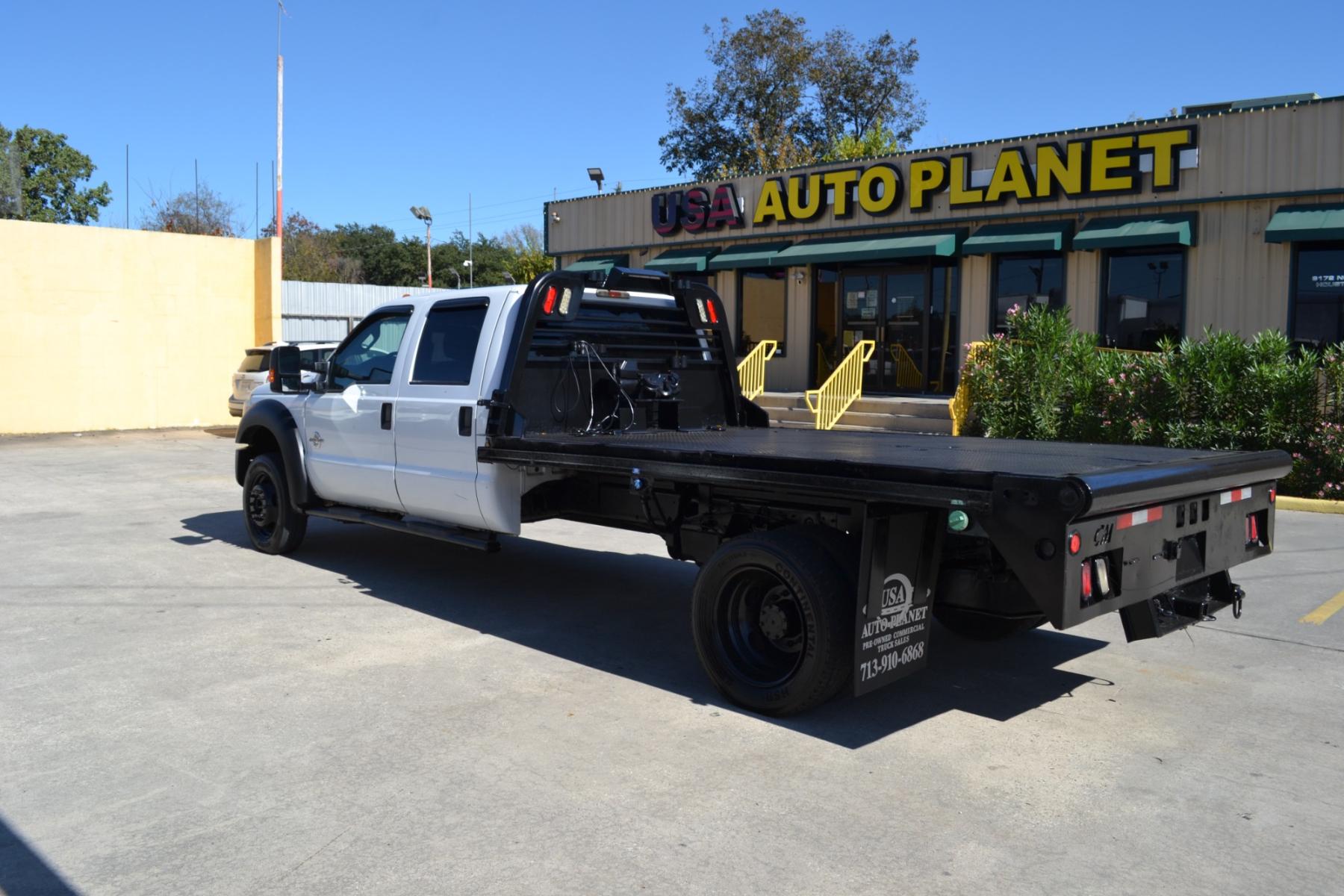 2013 WHITE Ford F550 with an POWERSTROKE 6.7L DIESEL engine, AUTOMATIC transmission, located at 9172 North Fwy, Houston, TX, 77037, (713) 910-6868, 29.887470, -95.411903 - CREW CAB, 11FT FLATBED, BUMPER PULL HITCH, 19,000LB GVWR , 4X4, POWER WINDOWS , LOCKS & MIRRORS, CRUISE CONTROL, COLD A/C - Photo #6